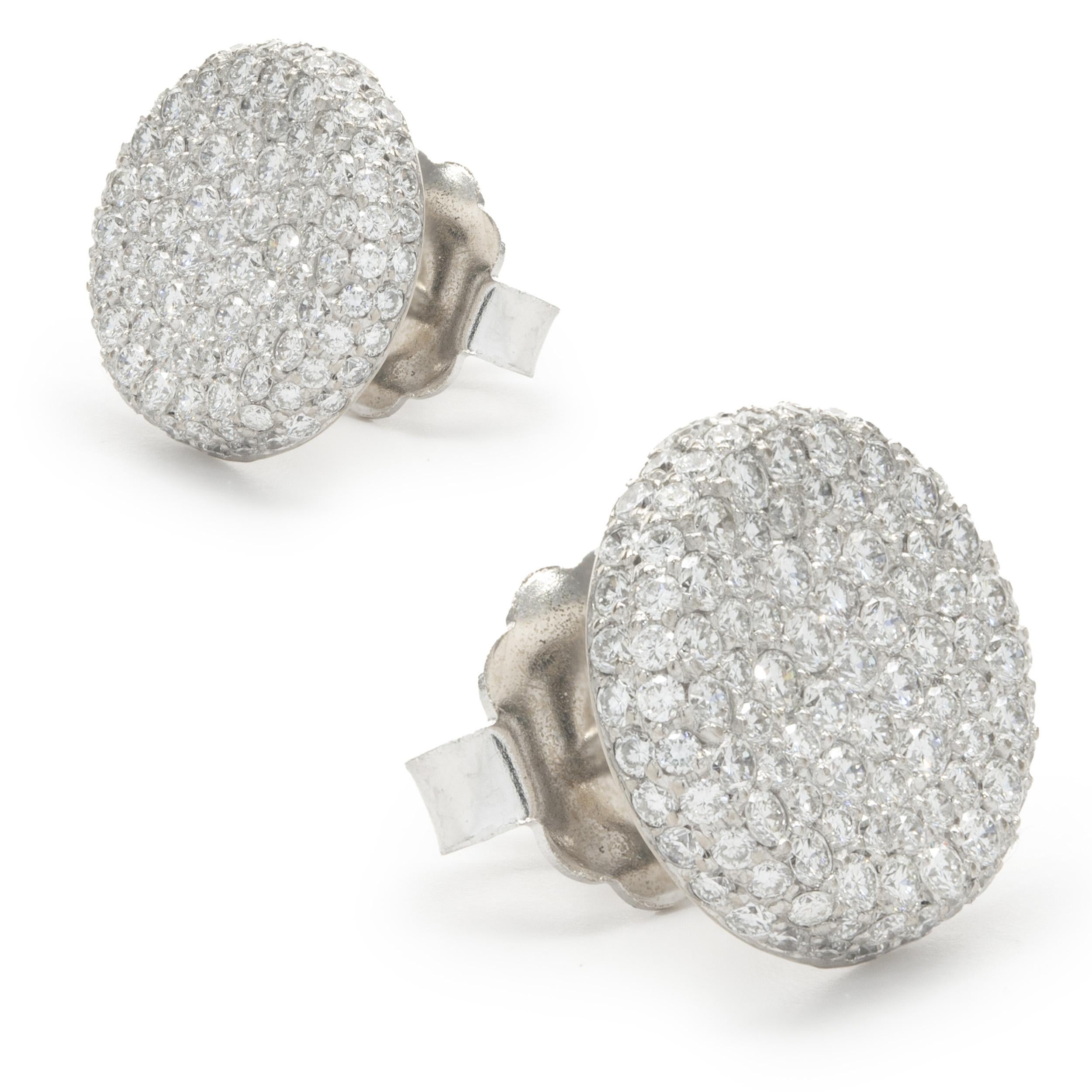 Designer: custom design
Material: 18K white gold
Diamonds: round brilliant cut= 2.82cttw
Color: G
Clarity: VS2
Dimensions: earrings measure 13.5mm long
Weight: 6.22 grams
