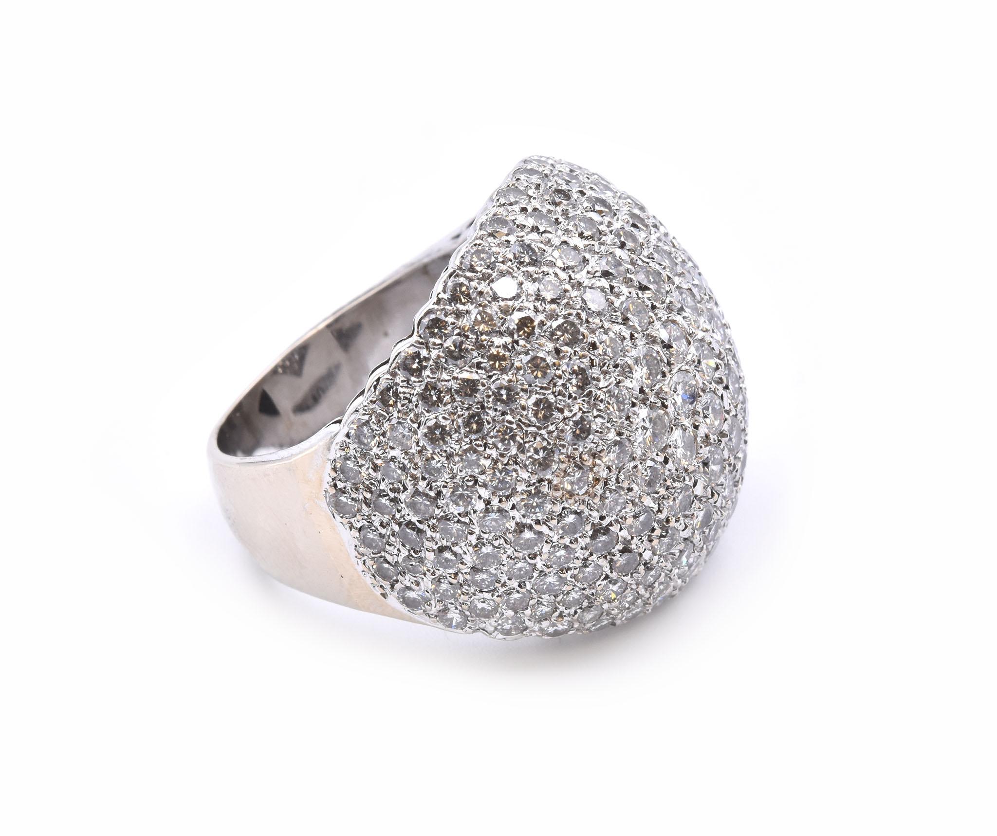 Designer: custom
Material: 18k white gold
Diamonds: 205 round brilliant cut = 7.50cttw
Color: G
Clarity: VS
Ring Size: 7 (Please allow up to two additional business days for sizing requests)
Dimensions: ring top measures 24.6mm wide
Weight: 23.57