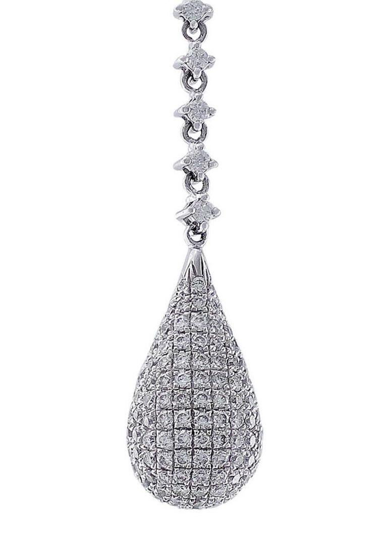 18kt white gold pave diamond drop earrings. Tear drop shaped dangle earrings with pave diamonds that are approximately 1.75ctw VS G-H.