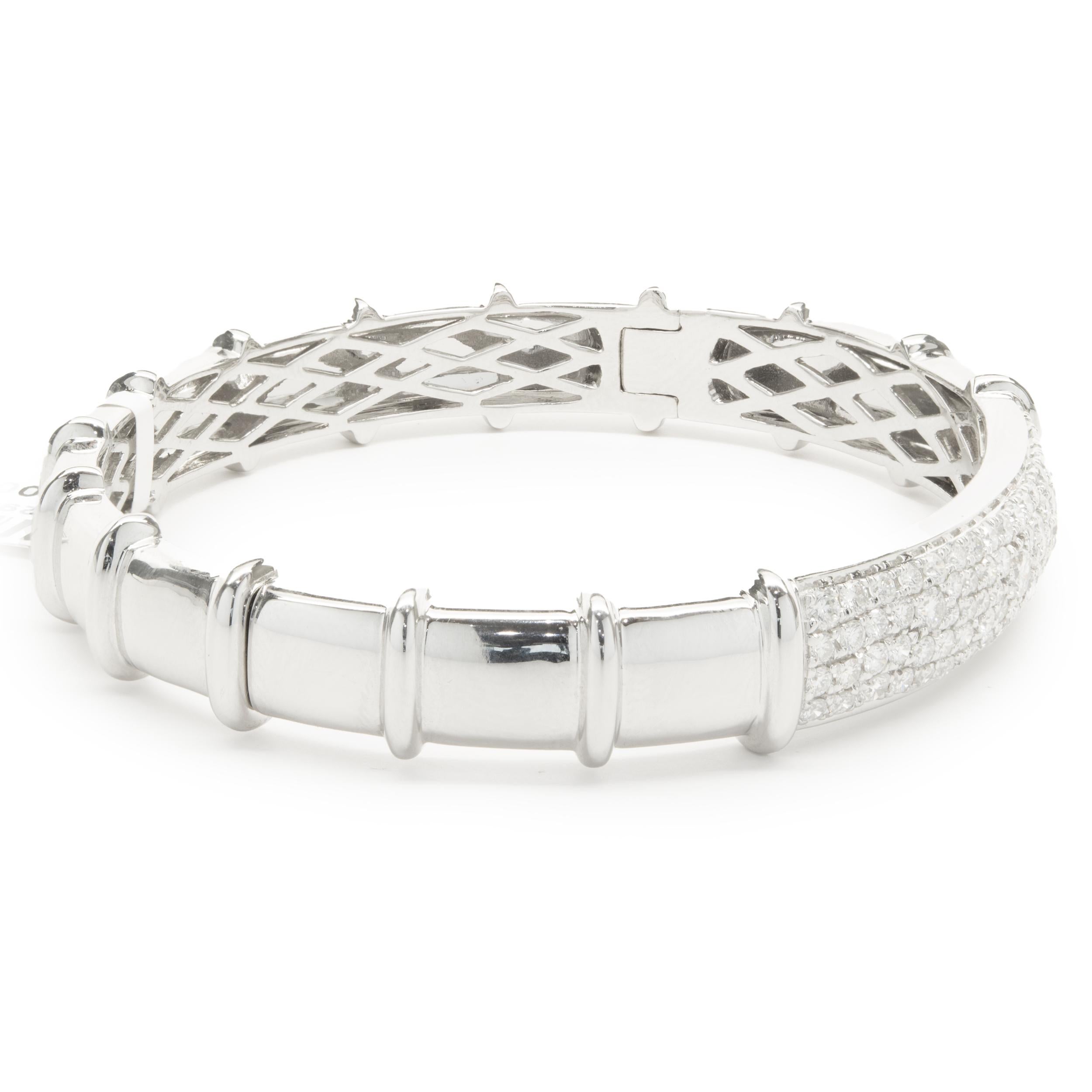 Designer: custom
Material: 18K white gold
Diamond: 81 round brilliant= 2.02cttw
Color: G 
Clarity: VS1
Dimensions: bracelet will fit up to a 7-inch wrist
Weight: 37.28 grams