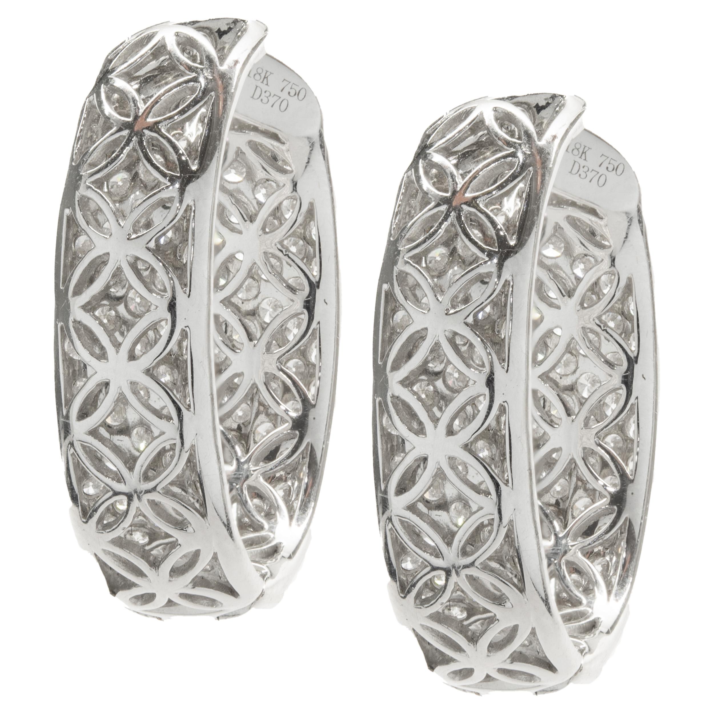 Designer: custom
Material: 18K white gold
Diamonds: 260 round brilliant cut = 3.70cttw
Color: G
Clarity: VS1
Dimensions: earrings measure 25.9 X 7.01mm
Weight: 11.13 grams