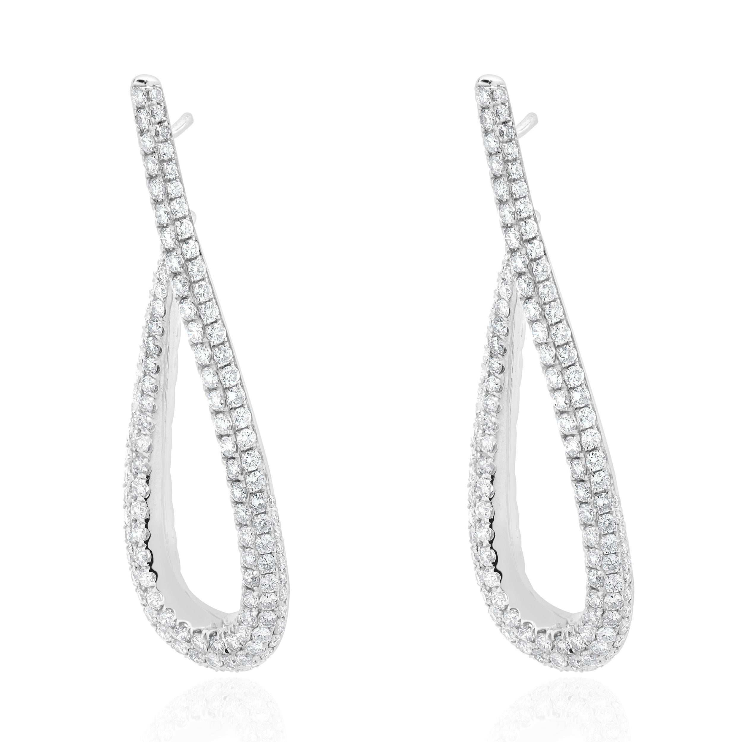 Designer: custom design
Material: 18K white gold
Diamonds: 234 round brilliant cut = 4.25cttw
Color: F
Clarity: VS2
Dimensions: earrings measure 60mm in length
Weight: 10.20 grams

