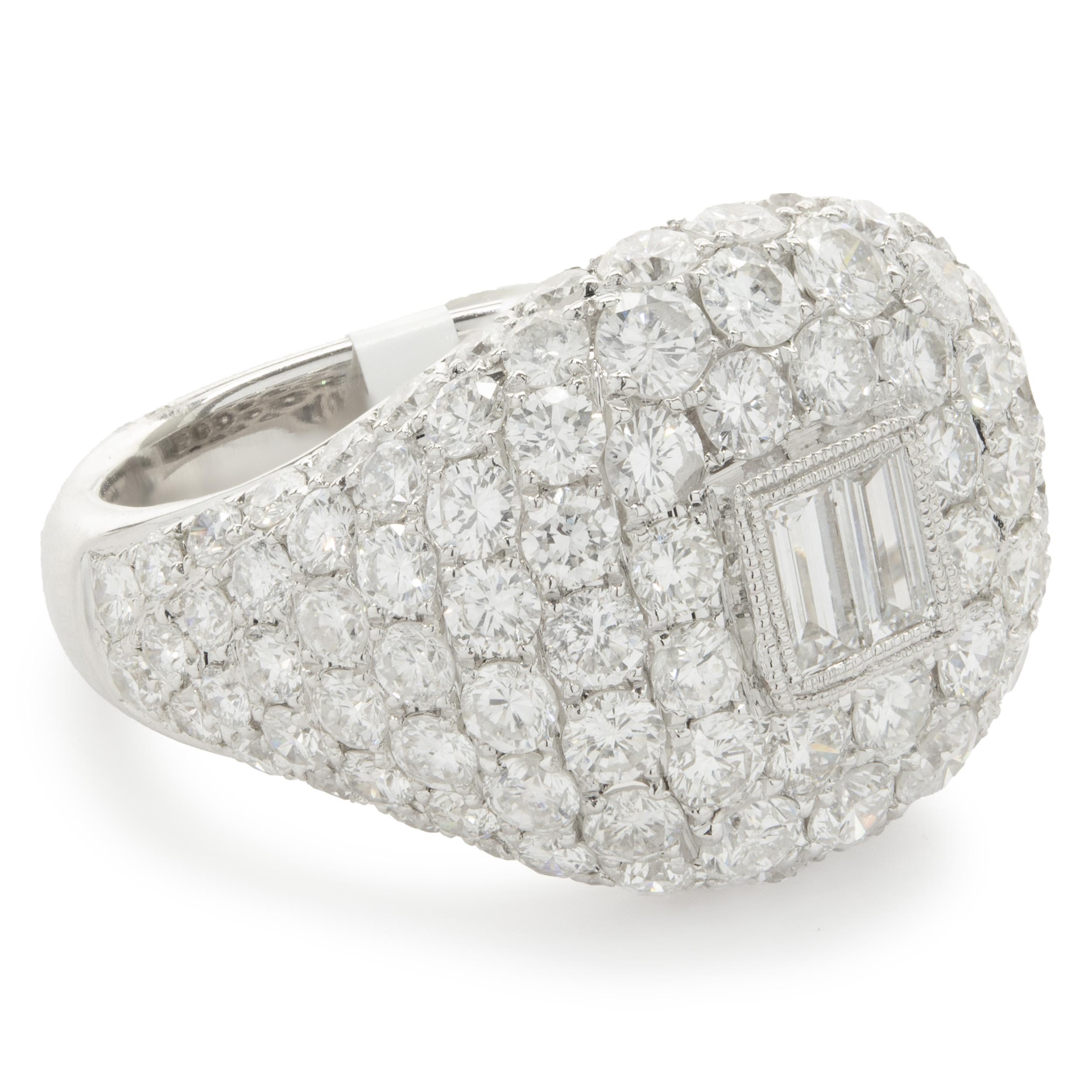 Designer: custom
Material: 18K white gold
Diamonds: 110 round brilliant cut = 3.52cttw
Color: G 
Clarity: VS2
Diamonds: 2 baguette cut = 0.27cttw
Color: G 
Clarity: VS2
Ring size: 6.5 (complimentary sizing available)
Weight:  7.14 grams