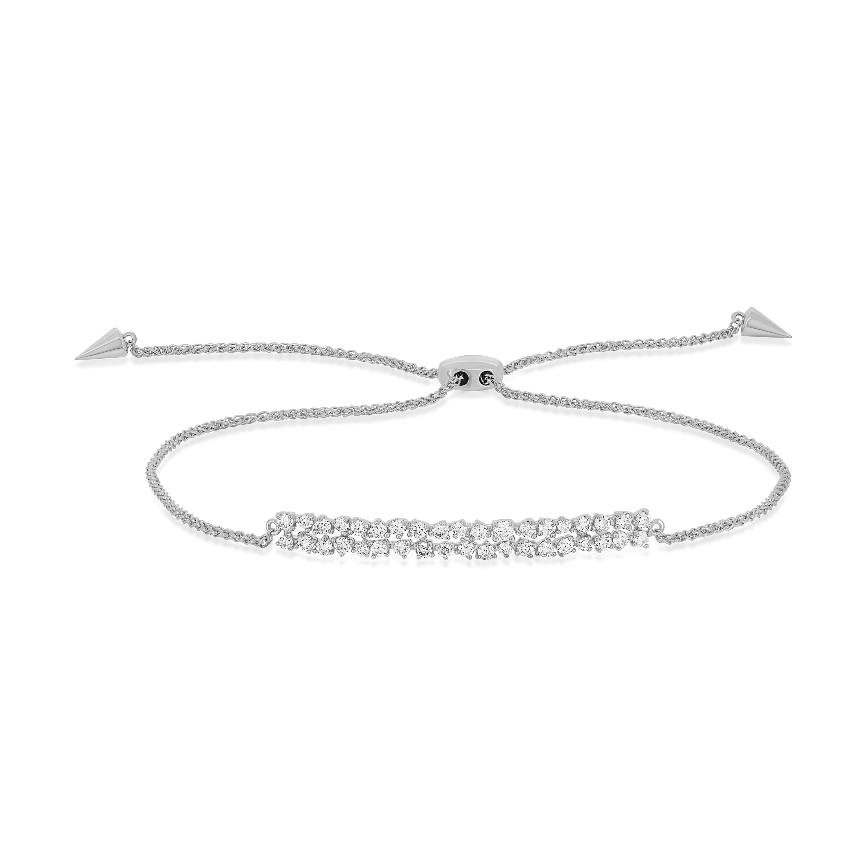 Chic yet stylish, this bracelet features a sleek rectangular bar sparkling with pave set 38 round cut diamonds. This bracelet is showcased with exceptional quality diamonds with a color grading of G-H color and a minimum clarity of I1. This bracelet