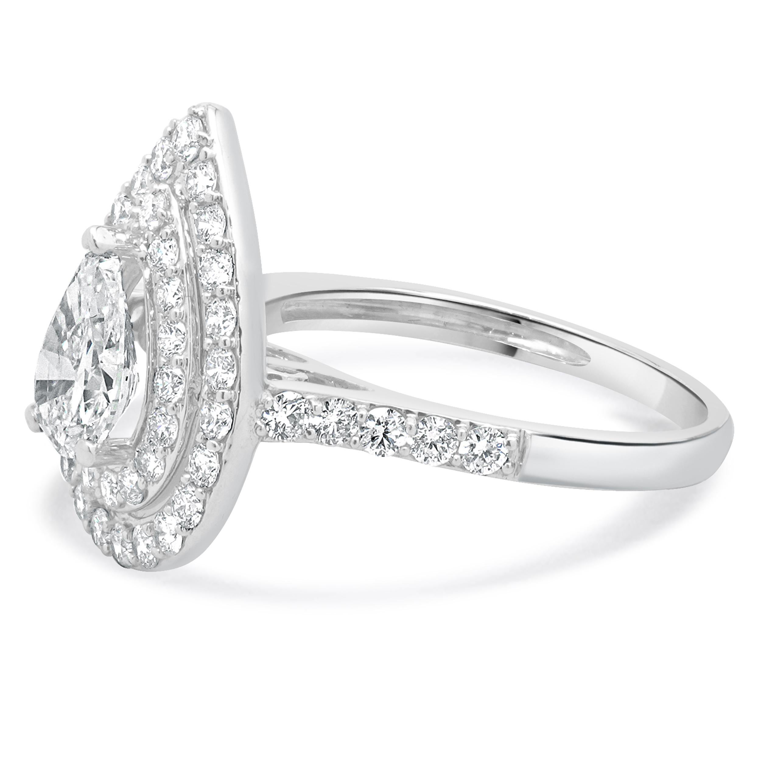 Material: oro blanco de 18 quilates
Diamante central: 1 talla pera = 0,90ct
Color: I
Claridad: SI2
Diamante: 50 talla redonda = 0,80ctw
Color: G
Claridad: SI2
Tamaño del anillo: 6,75 (espera hasta 2 días laborables más para solicitar el