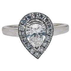 18 Karat White Gold Pear Cut Vintage White Diamond Engagement Ring