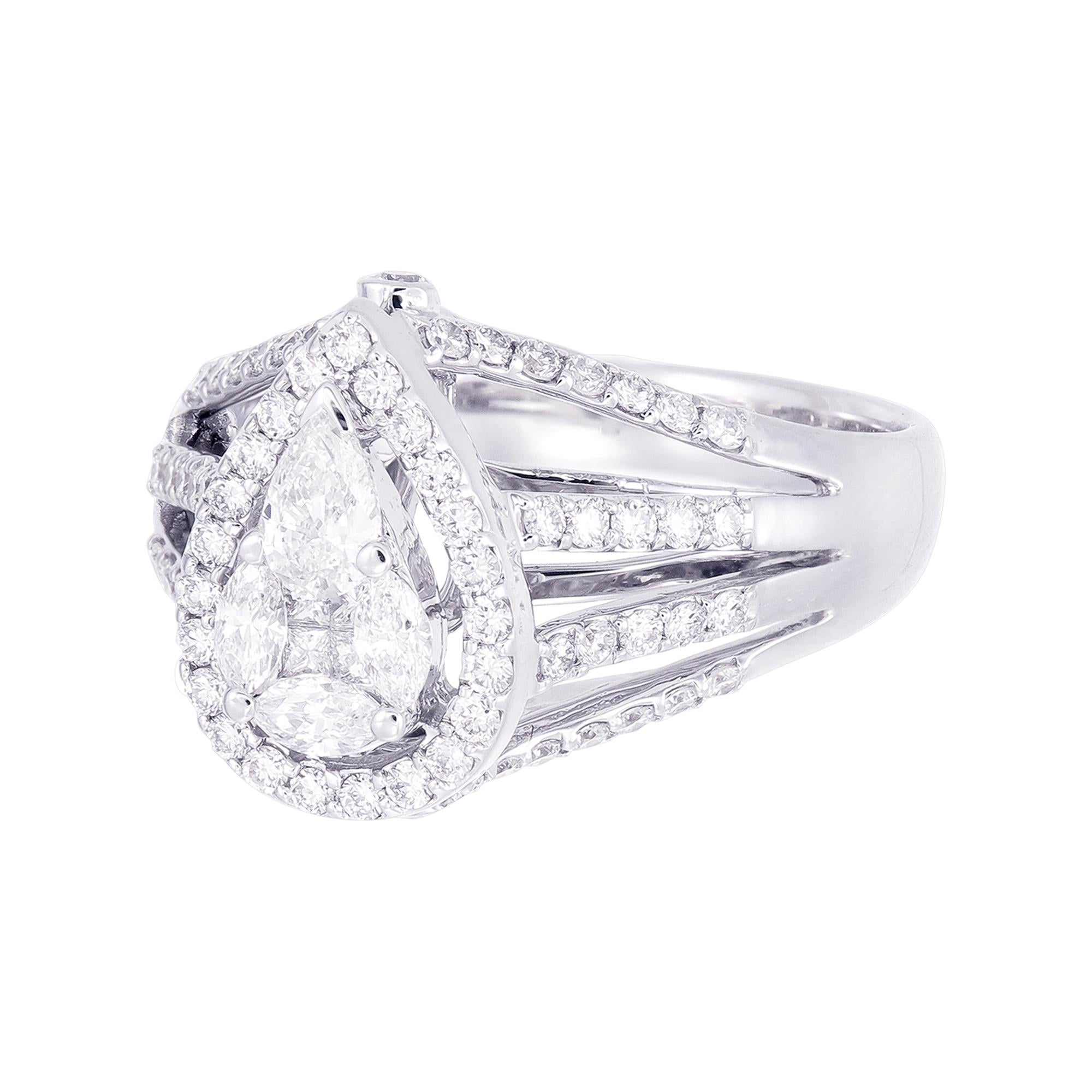 The dazzling luminescence of close set Round Brilliant Cut Diamonds on Handcrafted 18 kt white gold Viva Collection’s signature illusion setting is a guaranteed head turner. The ingenious use of a combination of a Princess Cut diamond, Pear Cut