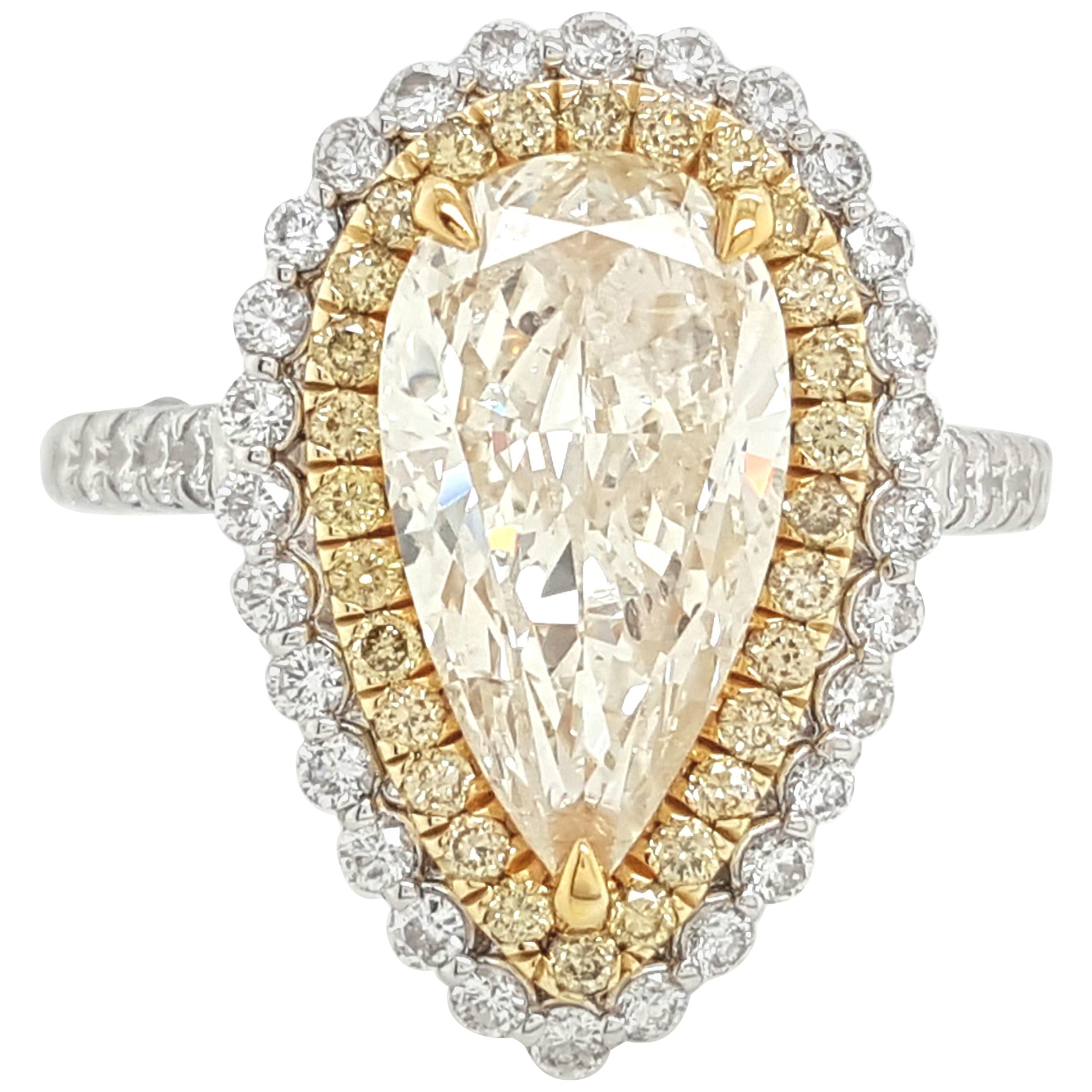 18 Karat White Gold Pear Shape Yellow Diamond Double Halo Engagement Ring
