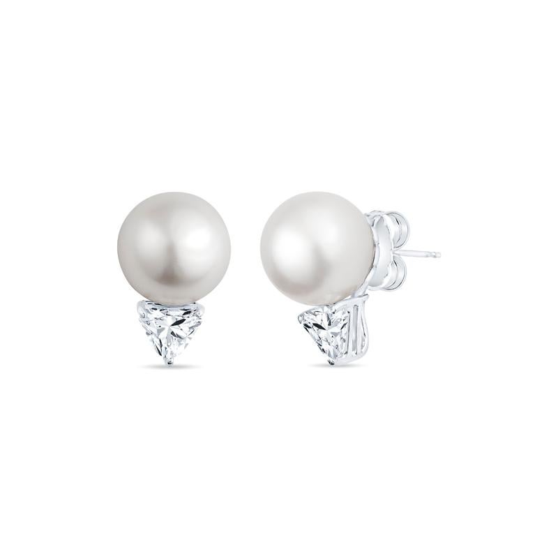 Elevate your elegance with these exquisite earrings featuring lustrous 13mm round white pearls, perfectly accented by sparkling shield cut diamonds totaling 1.00ctw. Crafted in luxurious 18K white gold, these accessories are a must-have for the