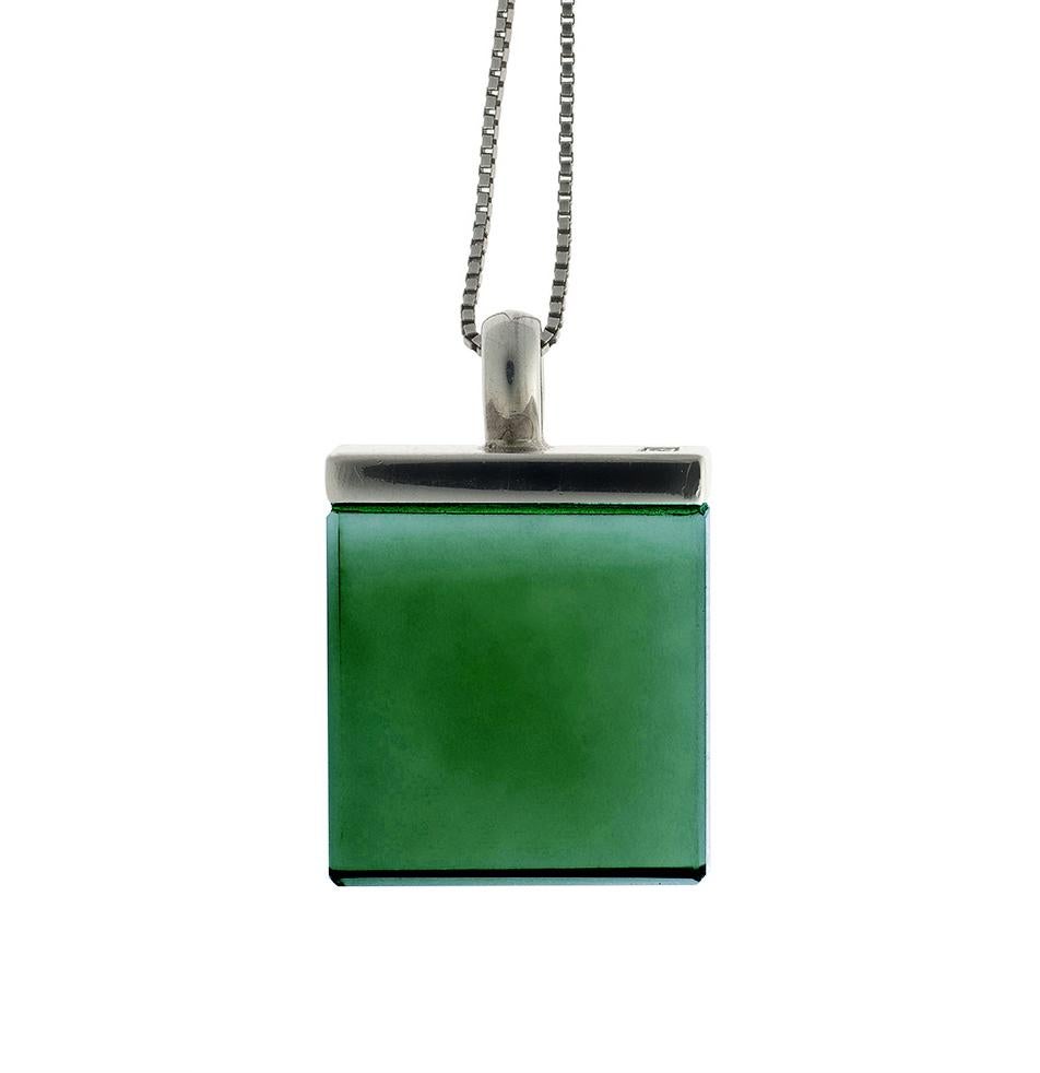 This art deco style pendant necklace is made of 18 karat white gold and features a large 15x15x8 mm vivid dark green quartz, which was cut specifically for the artist. It is a part of the Ink collection, which has been featured in issues of Harper's
