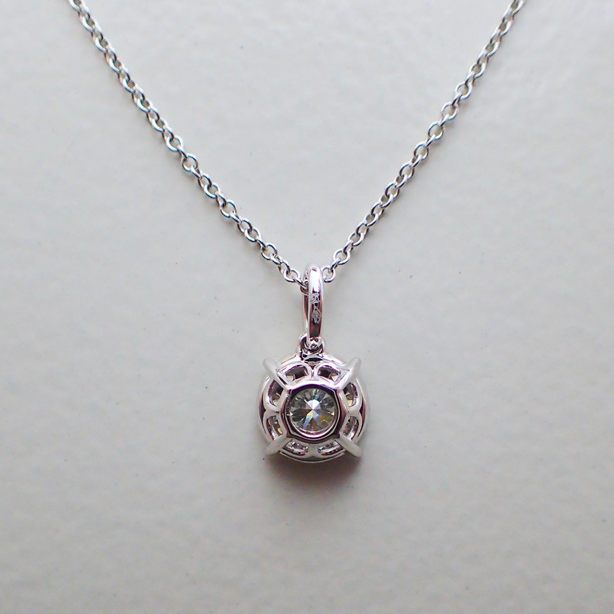 Round Cut 18 Karat White Gold Pendant with 0.46 Carat of Diamond Hangs from a Chain For Sale