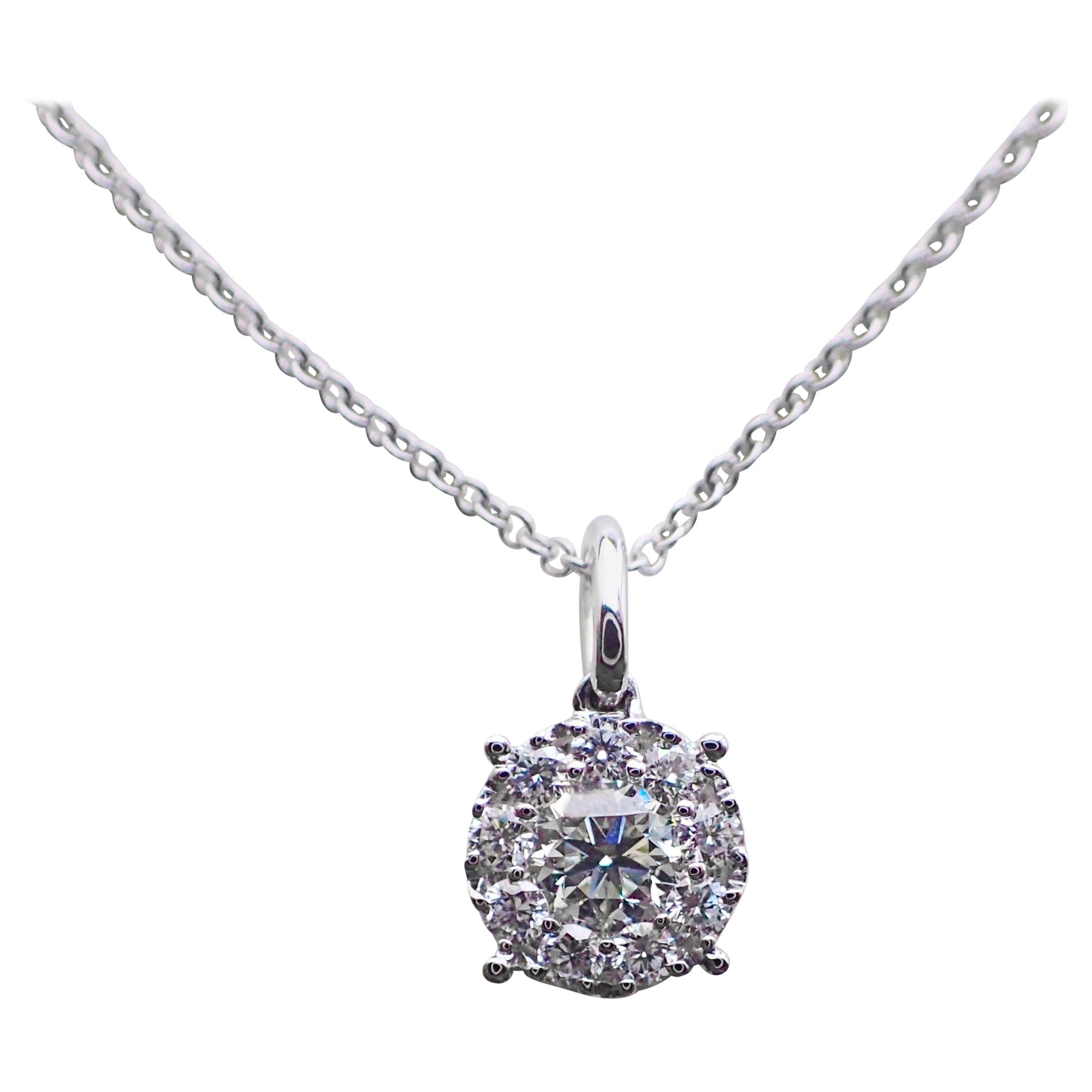 18 Karat White Gold Pendant with 0.46 Carat of Diamond Hangs from a Chain For Sale