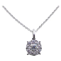 18 Karat White Gold Pendant with 0.46 Carat of Diamond Hangs from a Chain