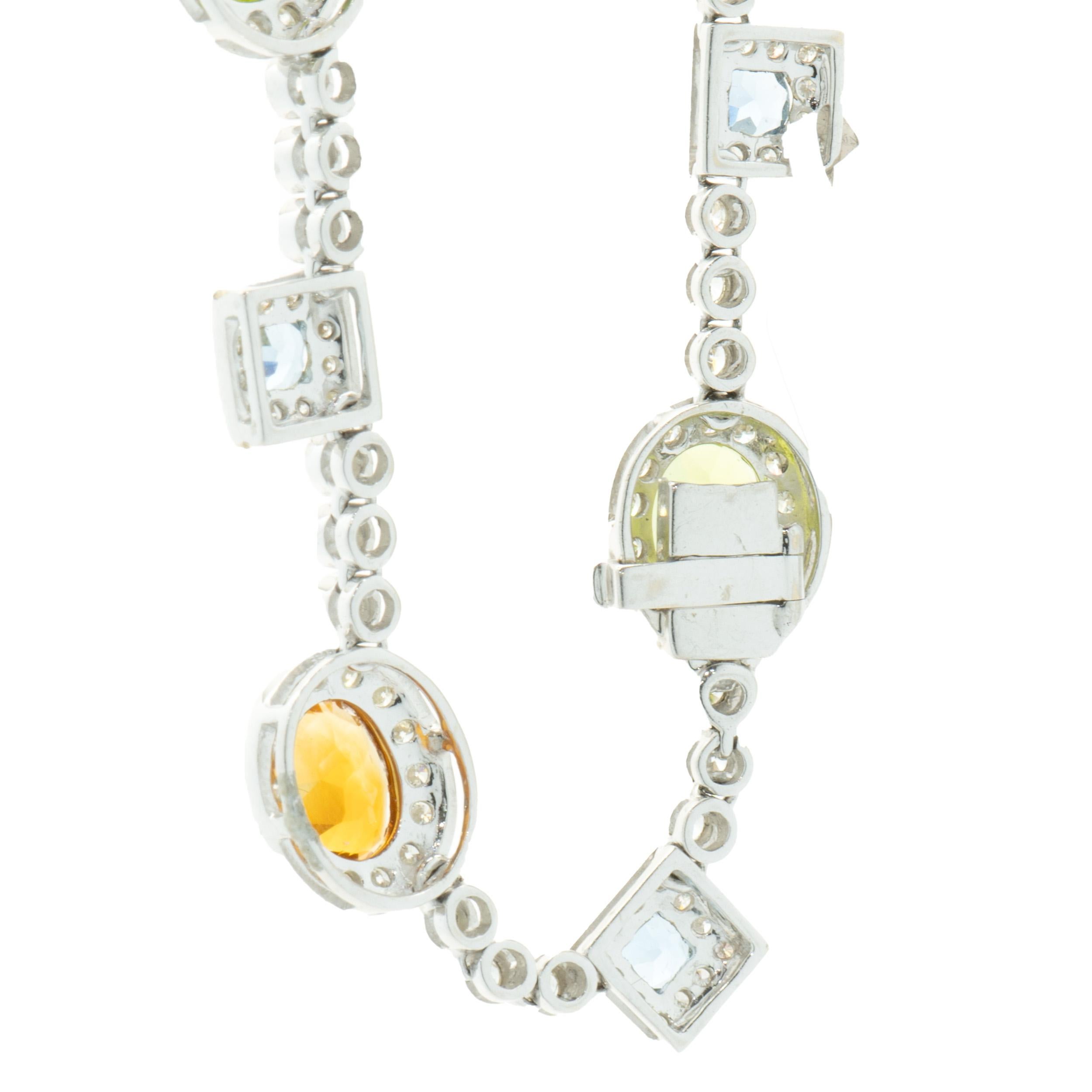 Oval Cut 18 Karat White Gold Peridot, Citrine, Blue Topaz, and Diamond Drop Necklace For Sale