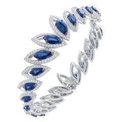 blue sapphire bangles 18 Karat White Gold Petali Blue Sapphire and Diamonds Bangle Bracelet