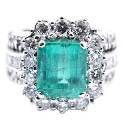 18 Karat White Gold Petros & Takis Emerald and Diamond Ring