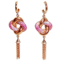18 Karat White Gold Pink Blue Sapphire Ruby Twist Knot Dangle Earrings