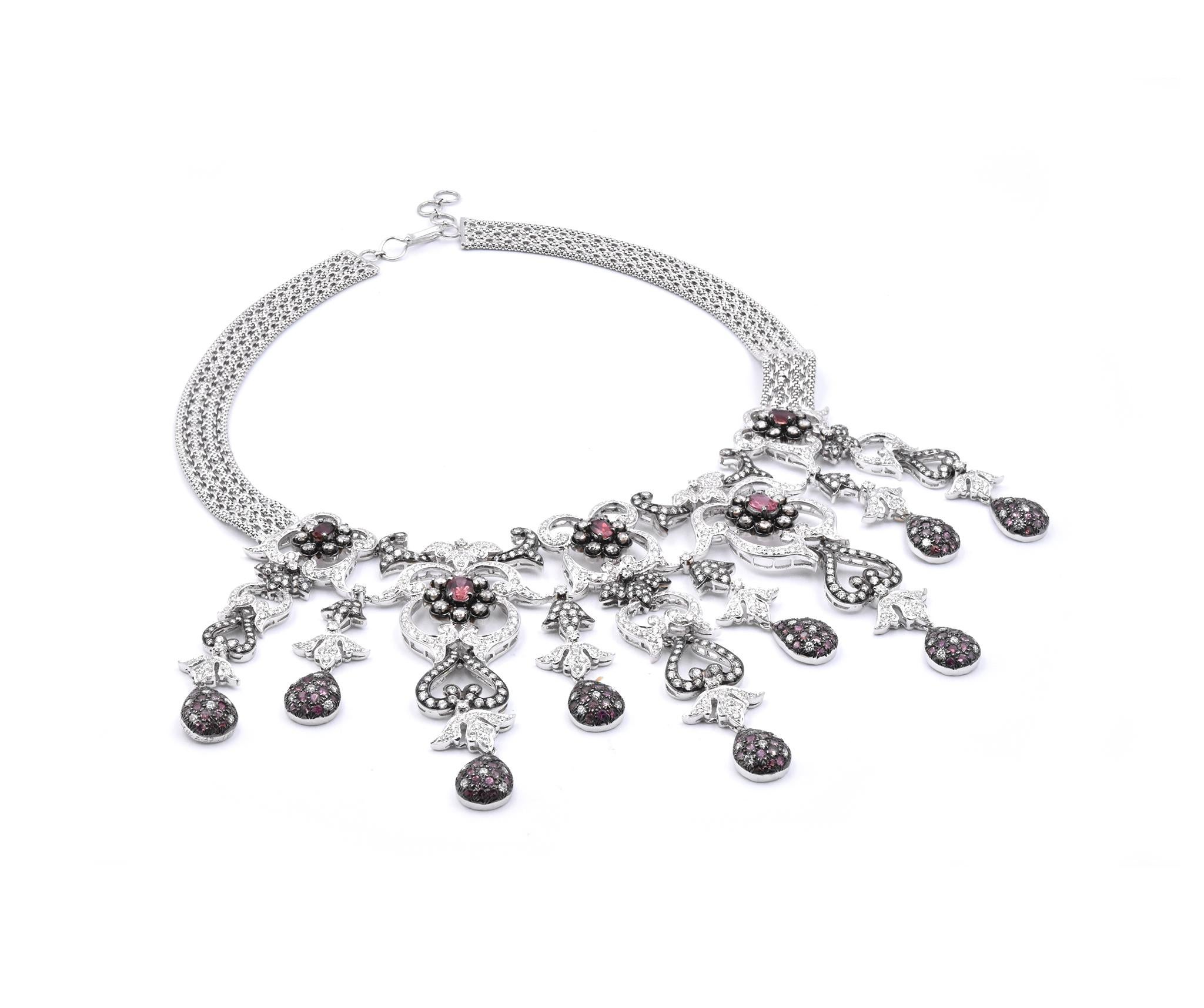 Material: 18k white gold
Gemstone: 125 Pink Sapphires oval and round brilliant cuts = 3.50cttw
Diamonds: 781 round brilliant cuts = 16.48cttw
Color: G
Clarity: VS
Cognac Diamonds: 35 round brilliant cuts= 1.90cttw
Dimensions: necklace is 16-inches