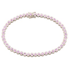 18 Karat White Gold Pink Sapphire Bezel Set Tennis Line Bracelet