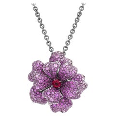 Used 18 Karat White Gold, Pink Sapphire, Ruby and Rubellite Flower Pendant and Brooch