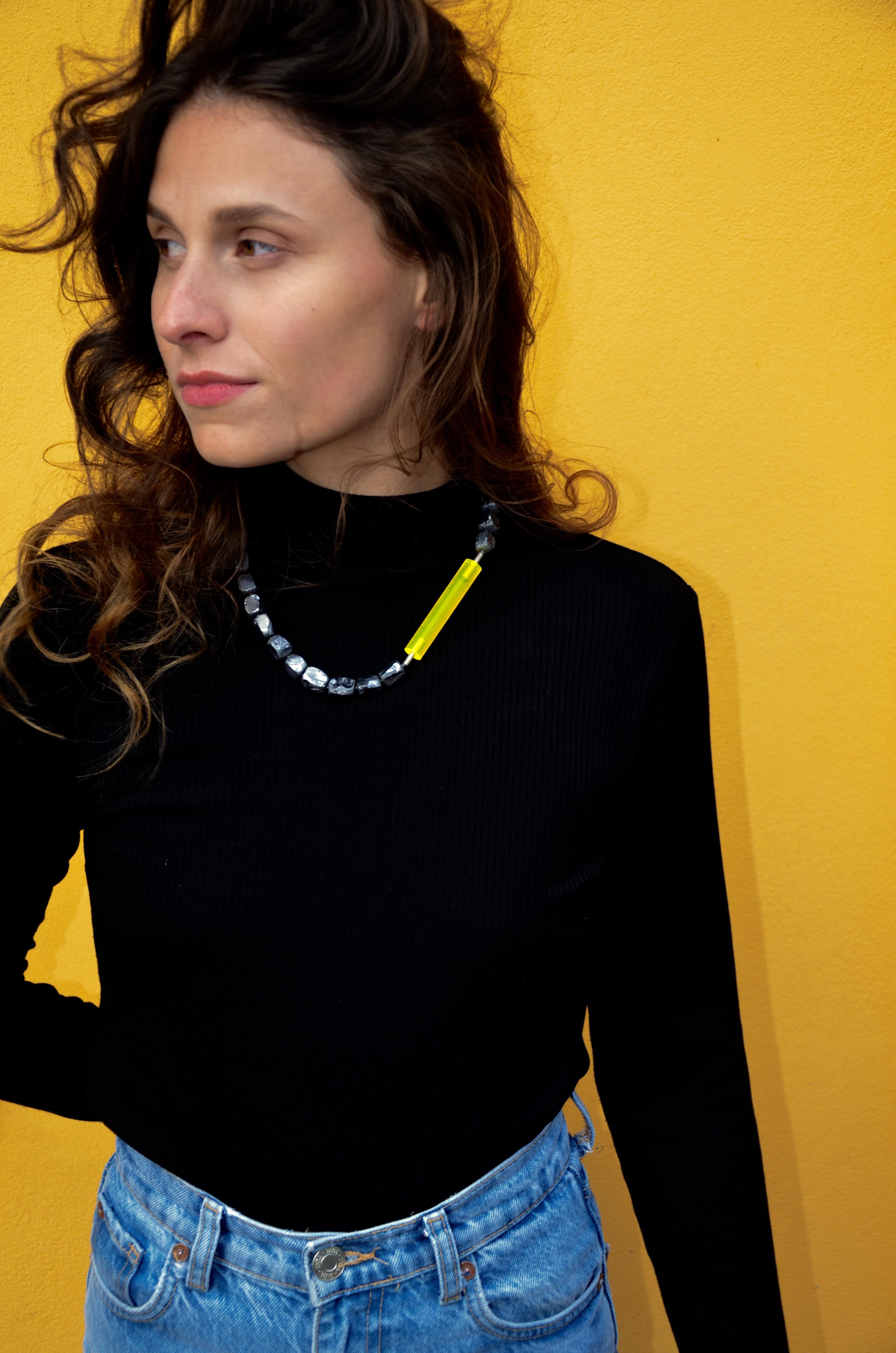 18 karat White Gold Plexiglas Silicium Nuggets Necklace. 

A unique creation by Arno Schneider, a combination of 18 carat white gold, Plexiglas and Silicium nuggets, a frereshing mix, an unconventional jewelry piece. Different materials, opposing