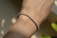 IGI Certified 18 Karat White Gold Princess Cut Diamond Tennis Bracelet