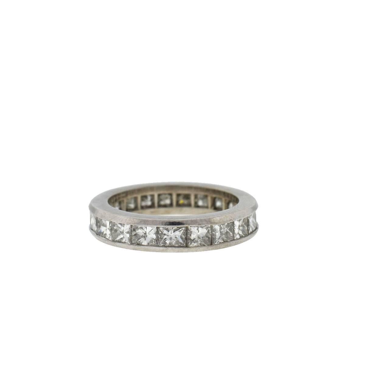 Company-N/A
Style-Princess Cut Eternity Band
Metal-18k White Gold
Size-6
Weight-7.5 grams	
Stones	Diamonds approx. 6.38cts
                  22 Stones
Sku:8928-2TEEE