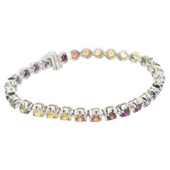 Bracelet tennis en or blanc 18 carats avec saphirs arc-en-ciel