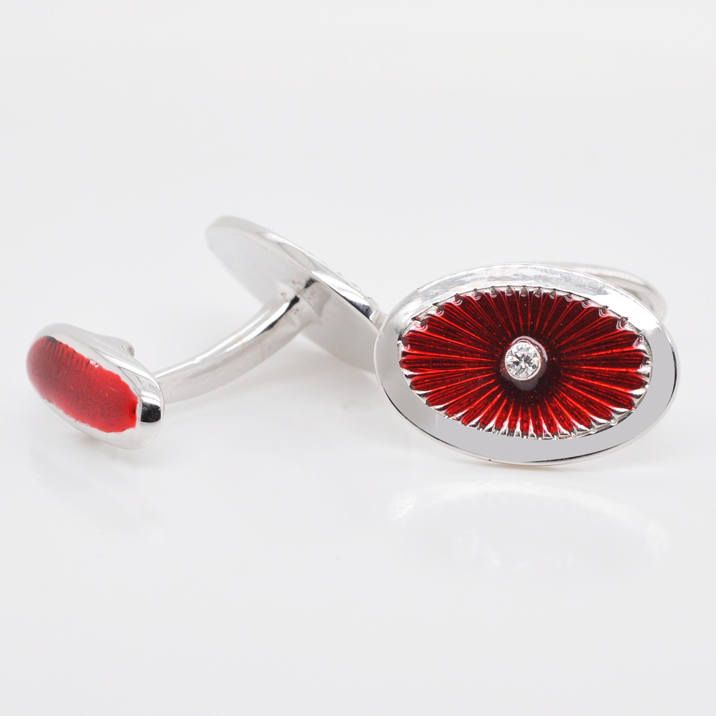Made from 18 karat white gold, these cufflinks are the perfect mix of contemporary style with a dash of deep red colour. These oval shaped cufflinks feature stunning deep red guilloché enamel with radiant patterns under the enamel, enveloped within