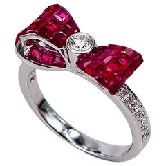 18 Karat White Gold Ribbon Invisible Ruby Ring