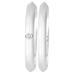 18 Karat White Gold Ring Pair with Diamond Inset