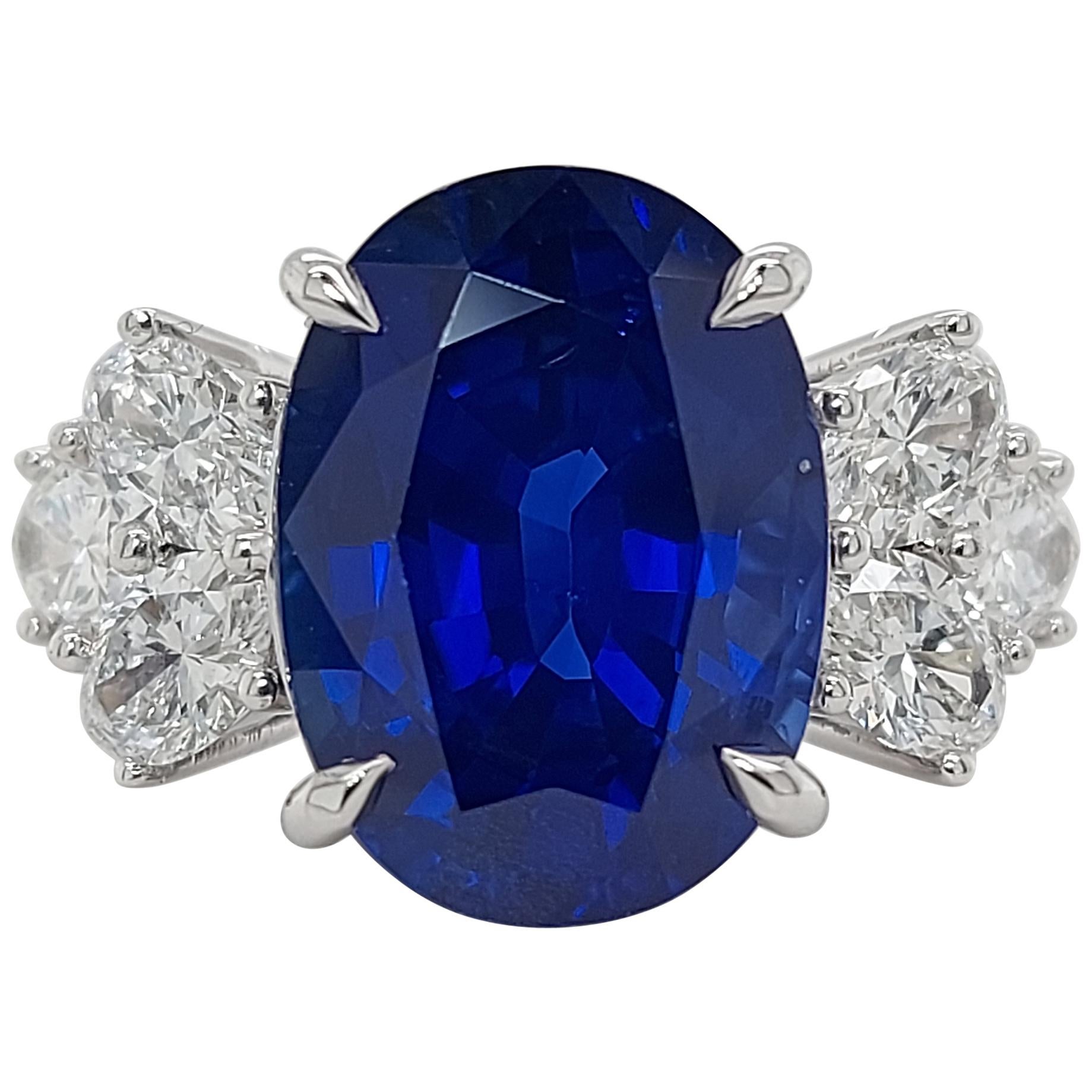 18 Karat White Gold Ring Set with a 7 Carat Sapphire and Diamonds