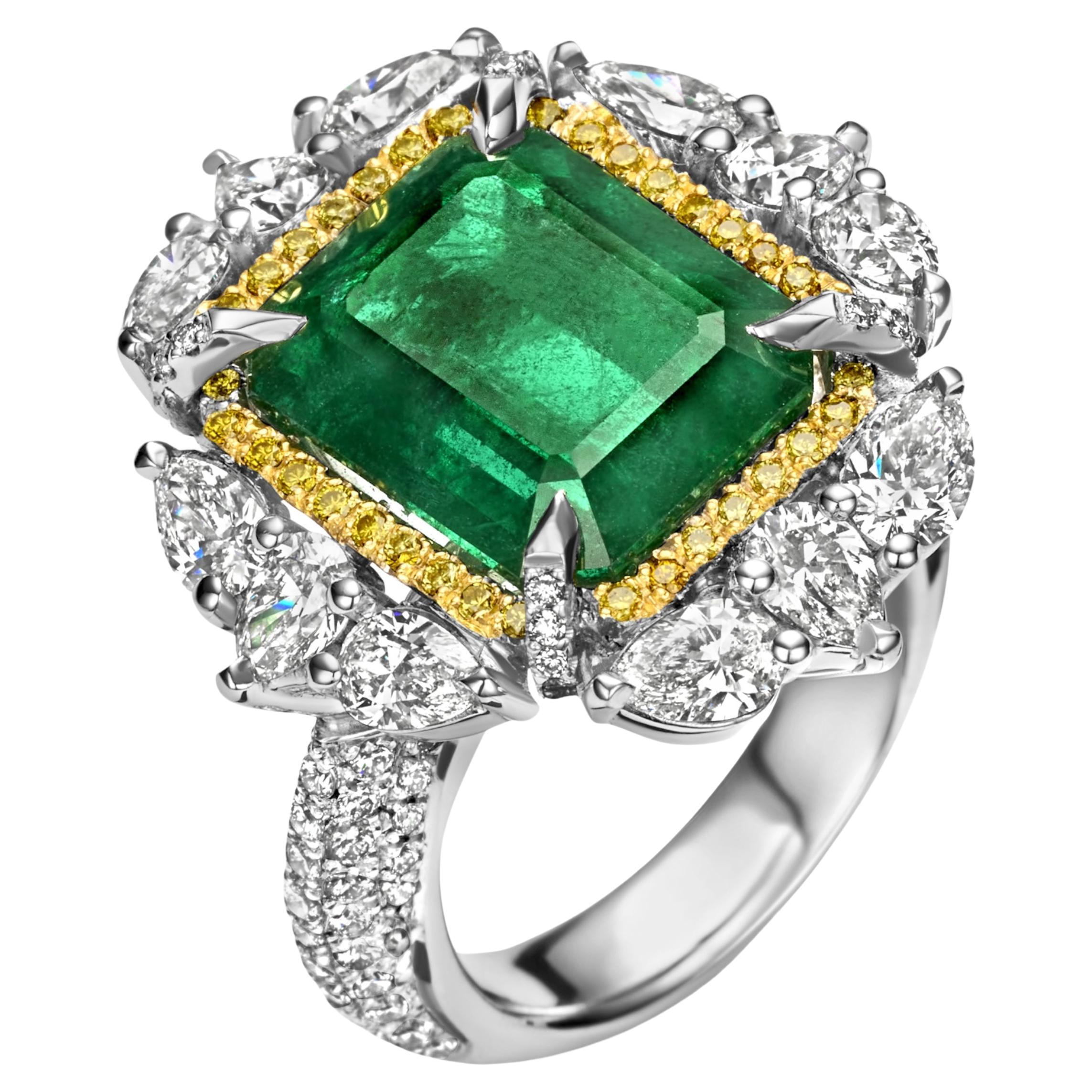 18 Karat White Gold Ring with 12.27 Carat Emerald, Pear Shape Diamonds 2.62 Ct For Sale