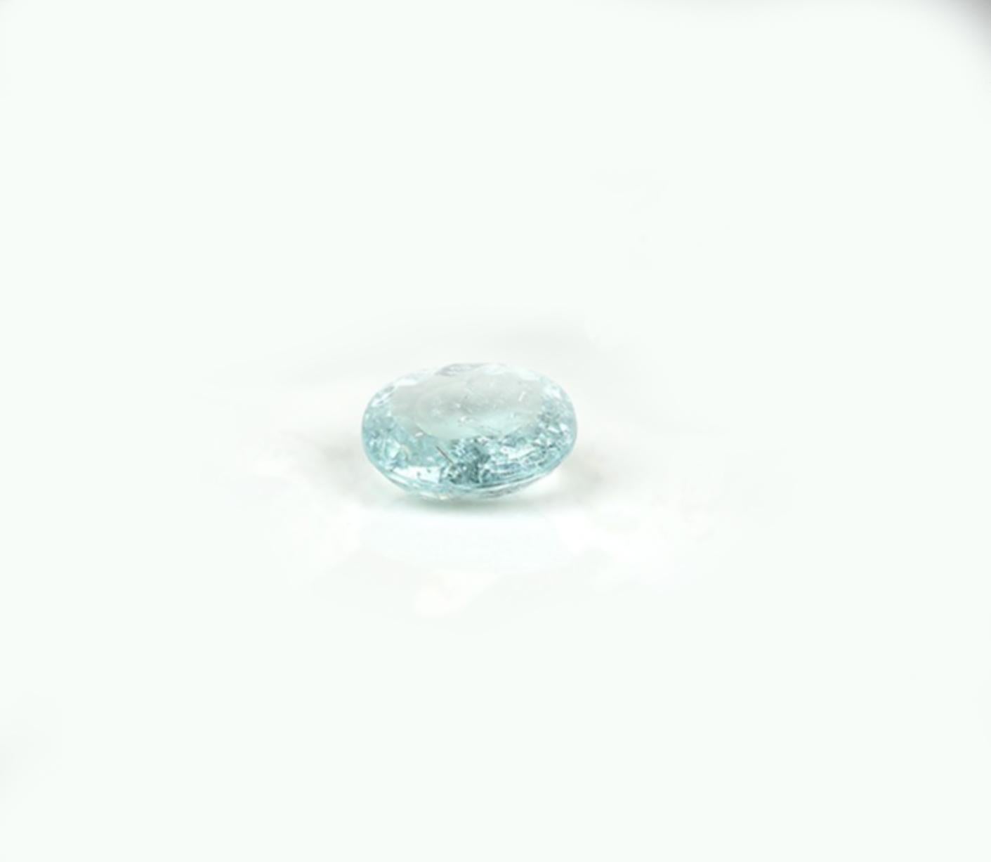 Contemporary White Gold Ring with Three Carats Neon Paraiba Tourmaline For Sale