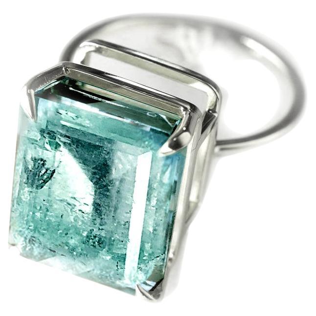 18 Karat White Gold Ring with Four Carats Very Blue Neon Paraiba Tourmaline