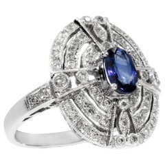 18 Karat White Gold Ring with 78 Diamonds and Sapphire
