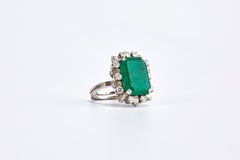 18 Karat White Gold Ring with 8.90 Carat Emerald Stone and Diamonds