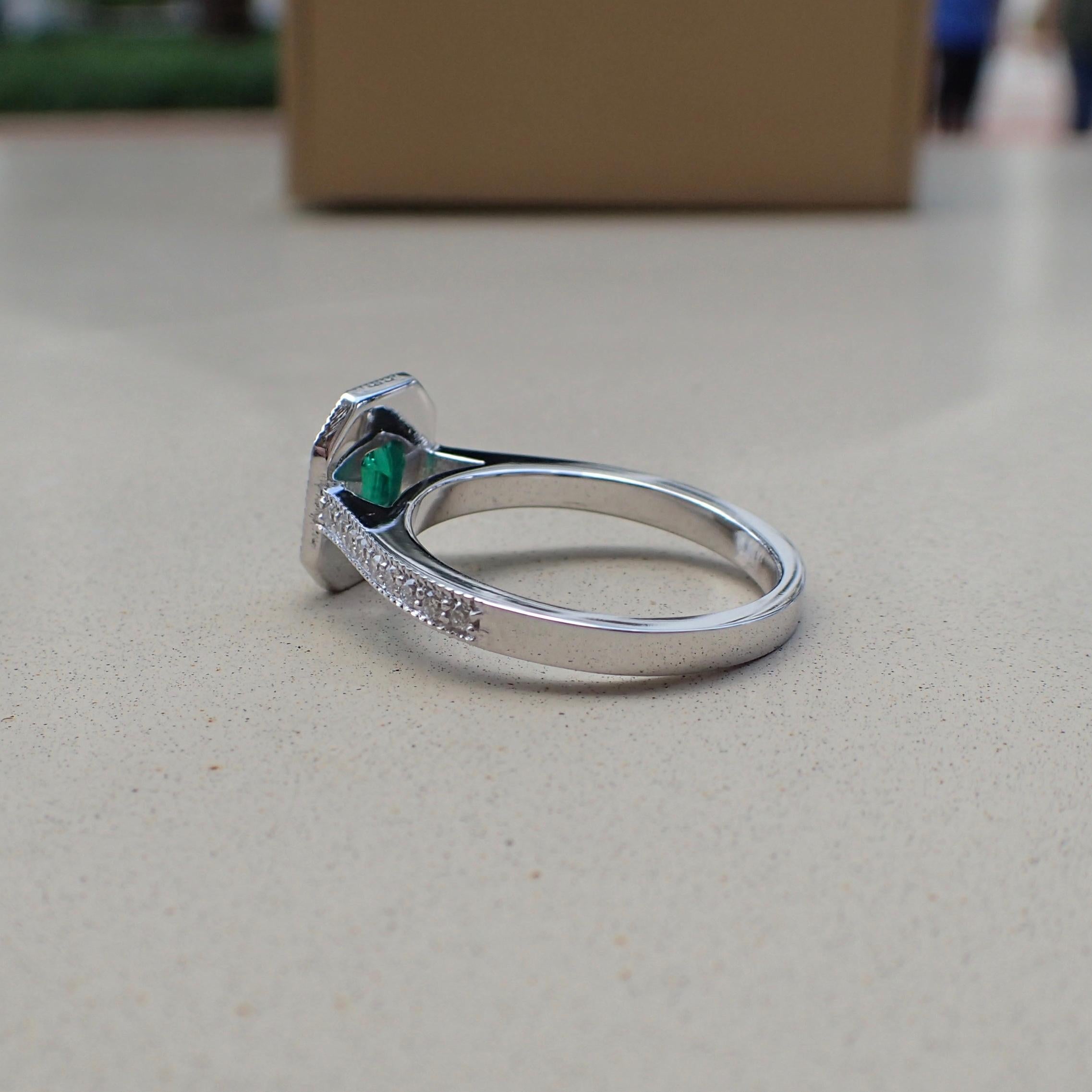 18 Karat White Gold Ring with a 0.518 Carat Emerald and 0.37 Carat of Diamond 1