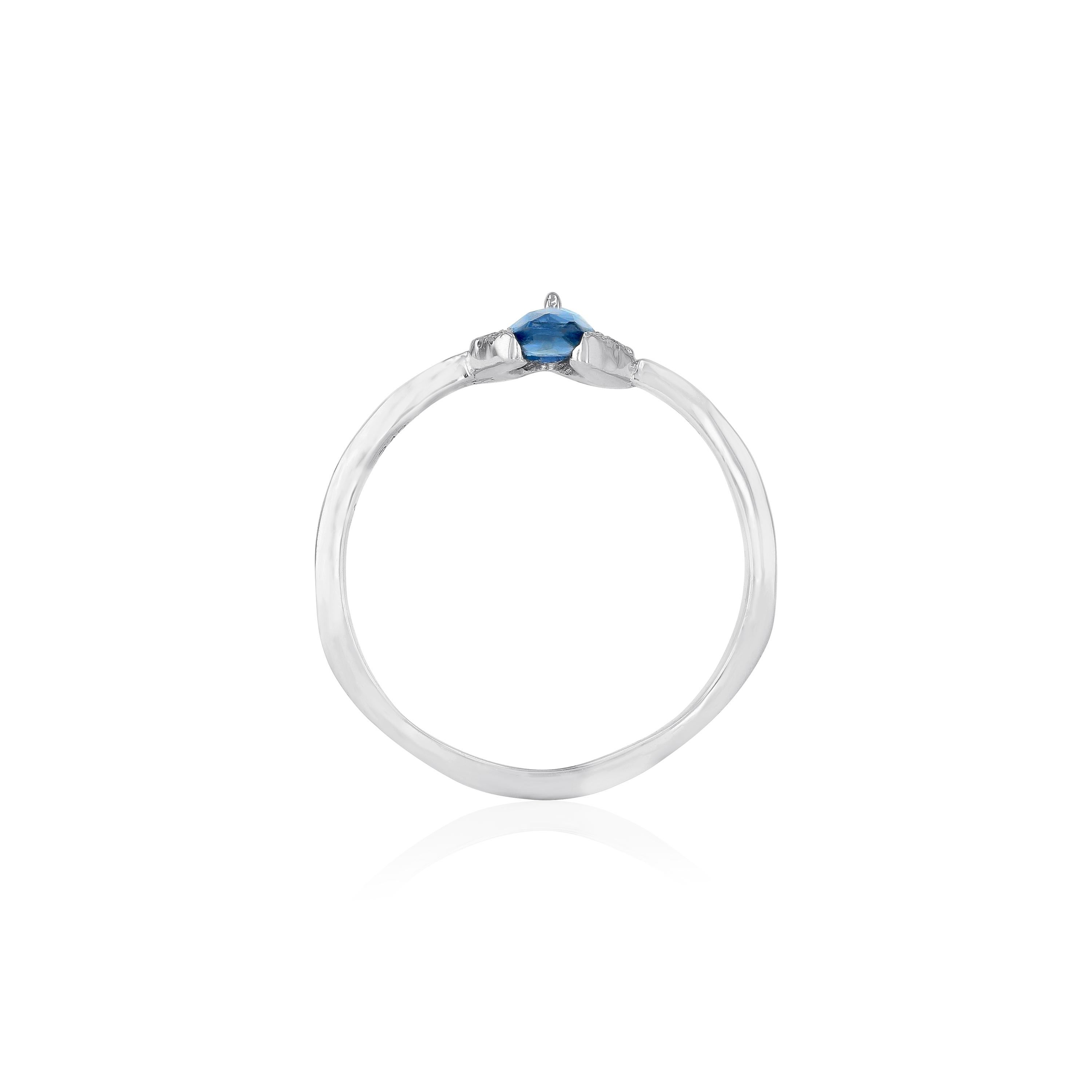 Inspired from the Arabesque designs and Islamic architecture, this ring is crafted from 18k white gold with blue sapphire and a marquise diamond on top. Slip it on with similar styles for stacked look.
 -Diamonds (Total Carat Weight: 0.15ct) 
- Blue