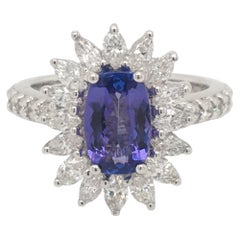 18 Karat White Gold Ring with Diamonds and Tanzanite Center Made in Italy