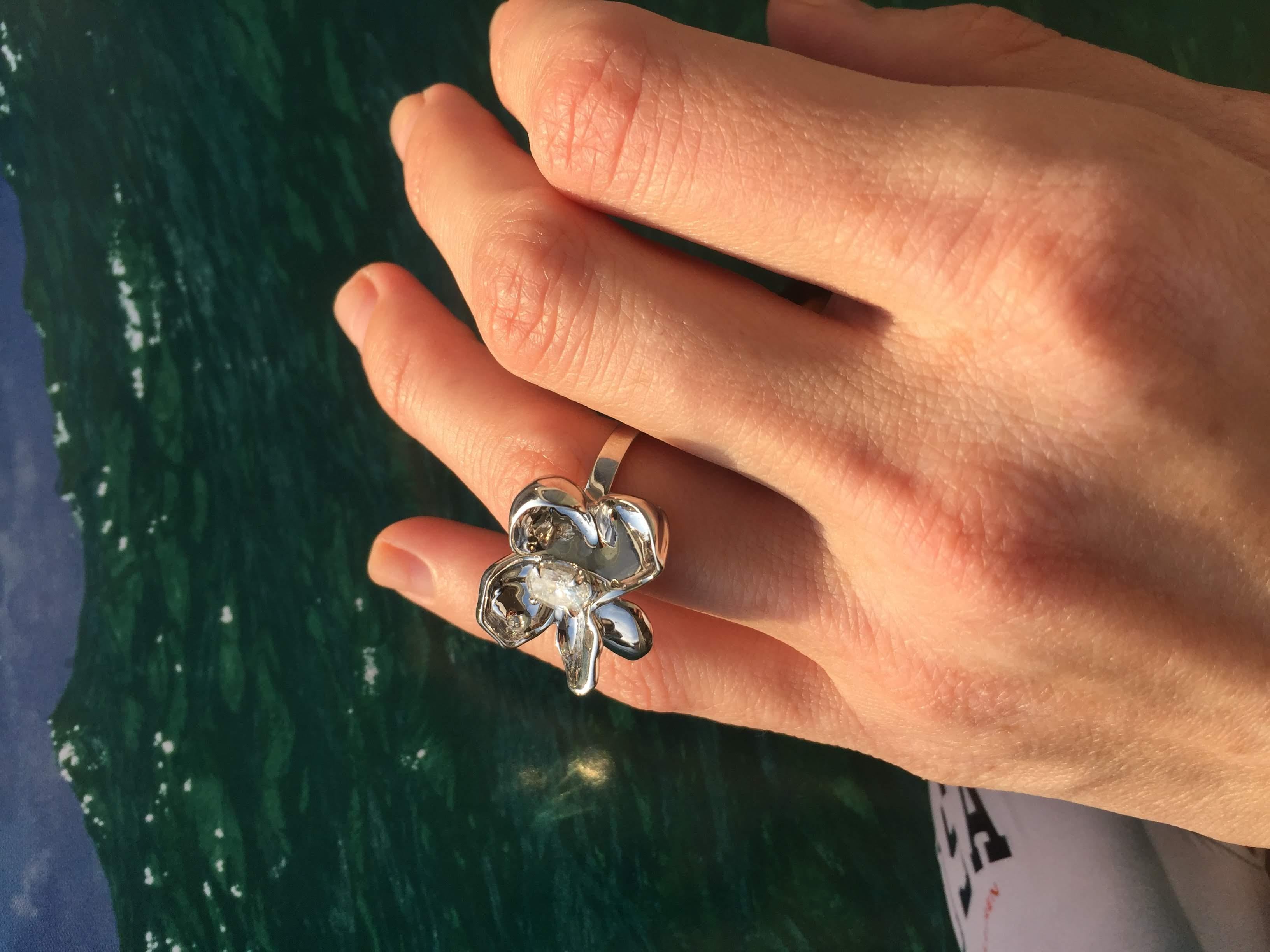 Women's Eighteen Karat White Gold Engagement Ring with Emerald Cut Diamond For Sale