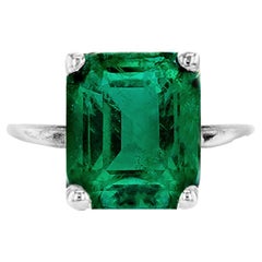Vintage Eighteen Karat White Gold Ring with Natural Green Four Carats Octagon Emerald