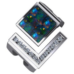 18 Karat White Gold Ring with Opal Inlay and .75 Carat Brilliant Cut Diamonds