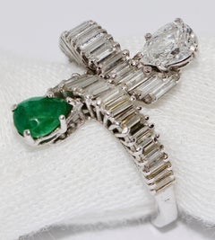 18 Karat White Gold Ring with Pear Cut Diamond and Emerald and Baguette Diamonds