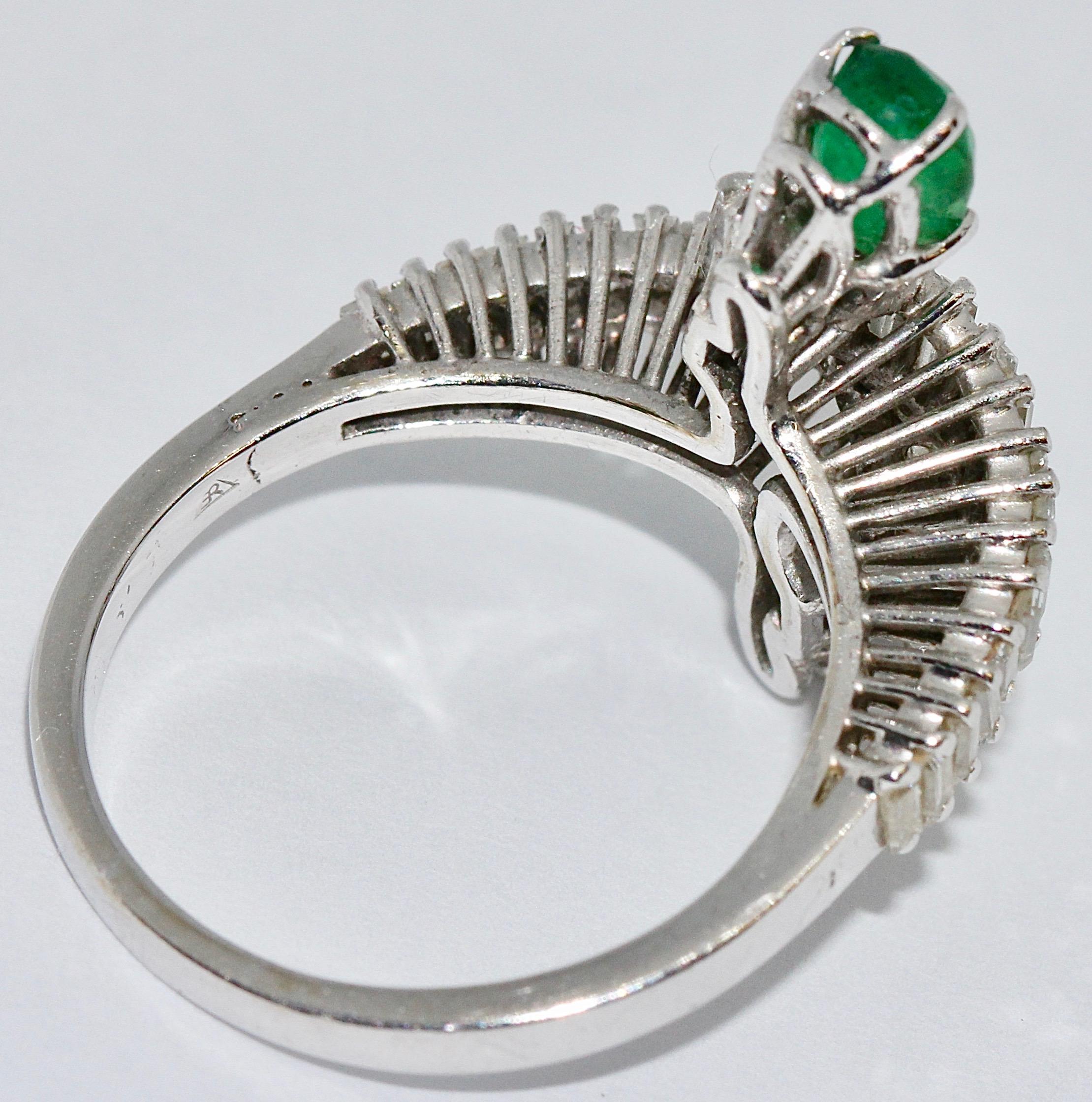 Women's 18 Karat White Gold Ring with Pear Cut Diamond and Emerald and Baguette Diamonds For Sale