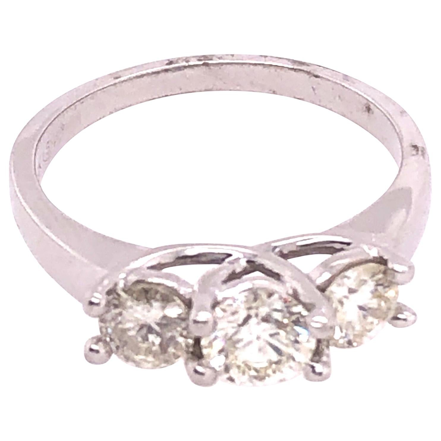 18 Karat White Gold Ring with Three Round Diamonds Totaling 1 Carat For Sale