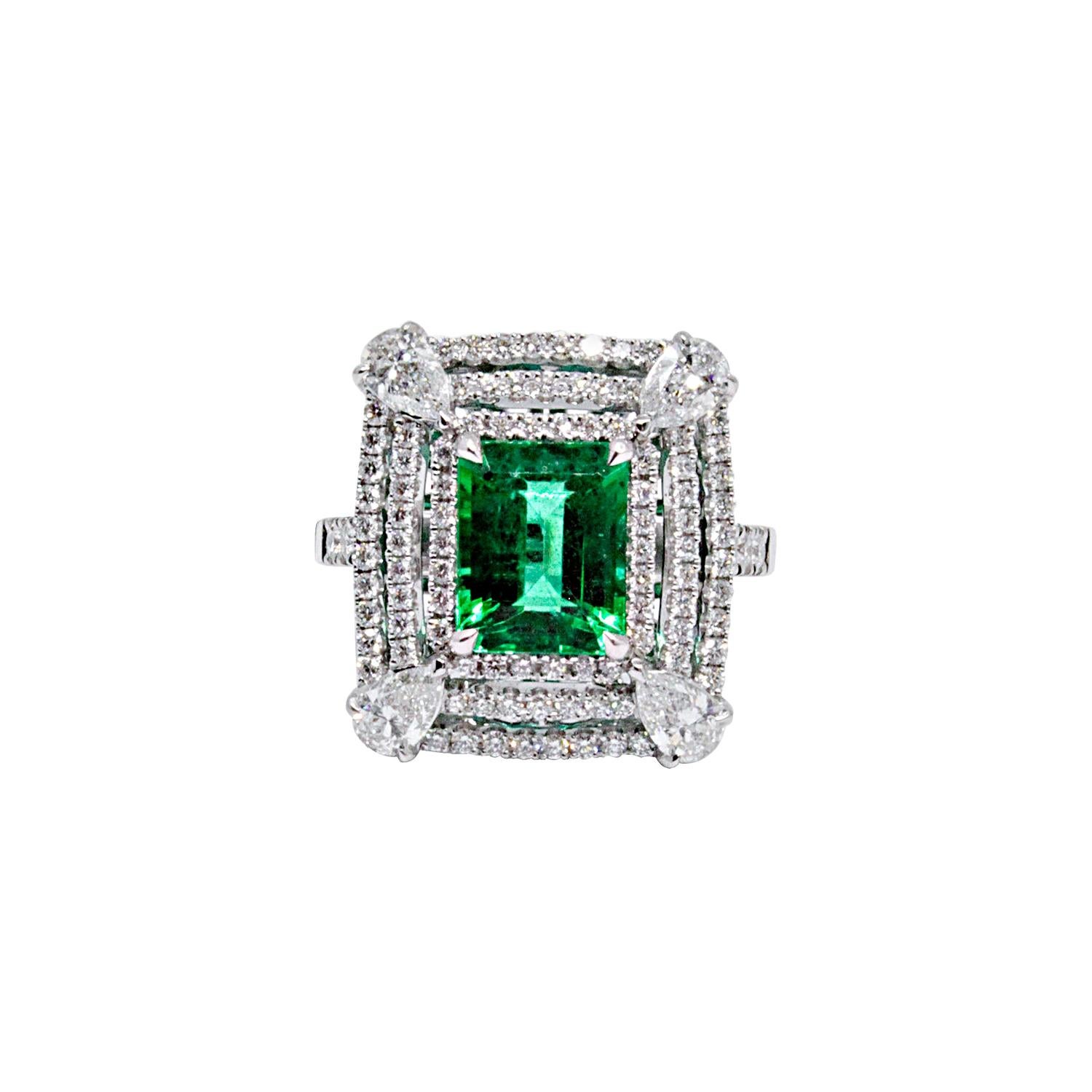 18 Karat White Gold Pear Cut White Diamonds and 2.77 ct Emerald Engagement Ring For Sale