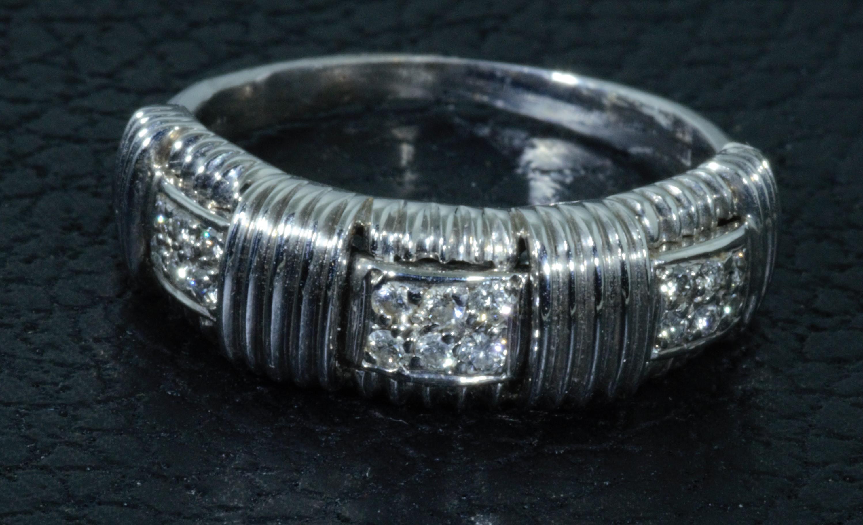 This ring is from the Appassionata collection by Roberto Coin. Crafted in 18kt white gold, a ribbed design provides the perfect backdrop for insets of pave diamond rectangles. This radiant ring from Roberto Coin showcases the designer's passion for
