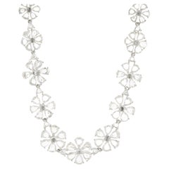 Collier à fleurs multiformes en or blanc 18 carats et diamants taille rose