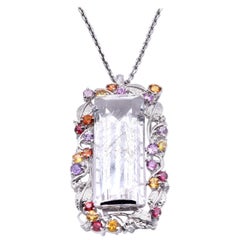 18 Karat White Gold Rutilated Quartz and Multi Sapphire and Diamond Pendant 18 Karat White Gold Rutilated Quartz and Multi Sapphire and Diamond Pendant